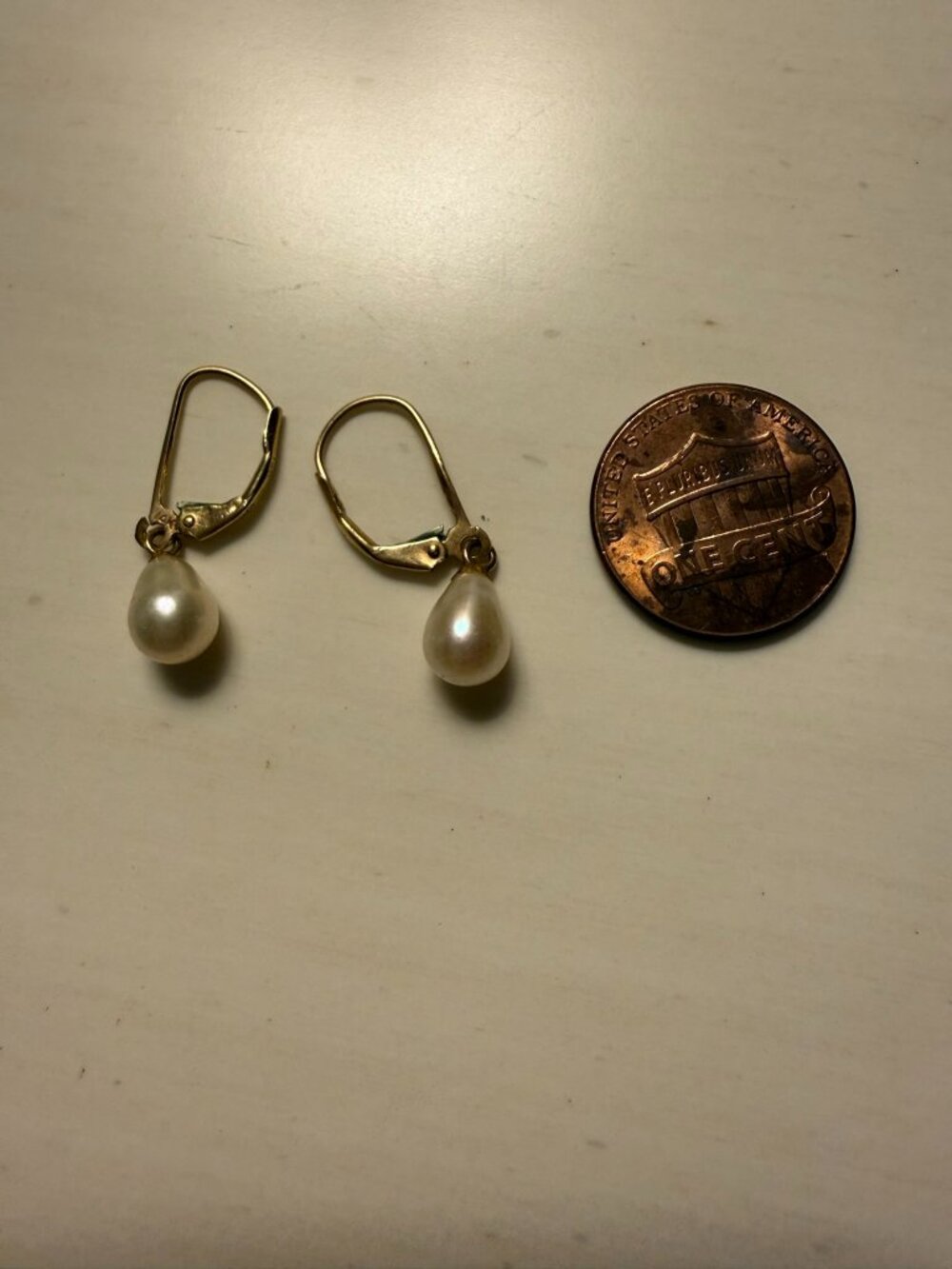 Gold and pearl earrings